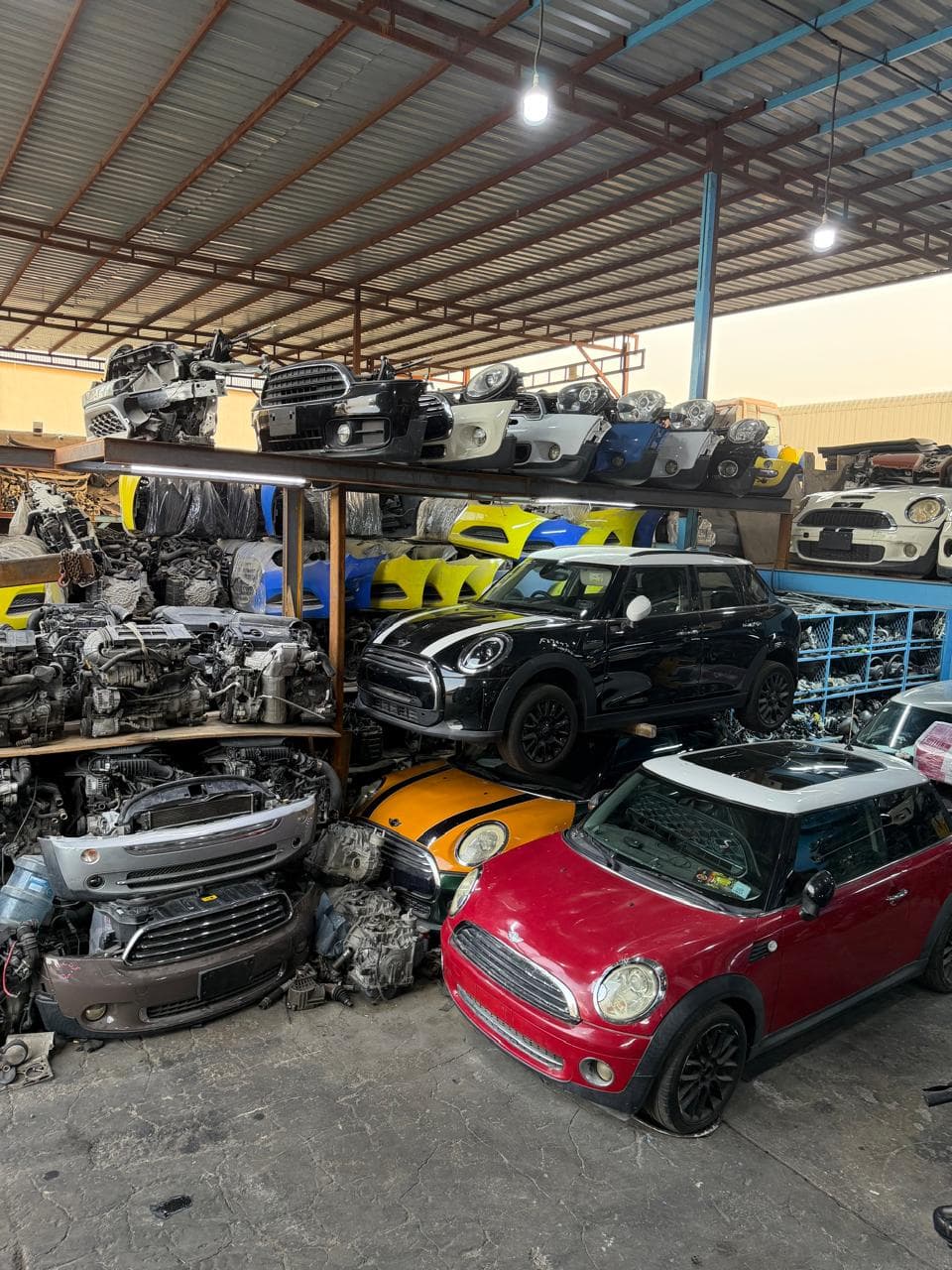 Wide view of MINI vehicles and used parts inside Wadi Al Zahiah